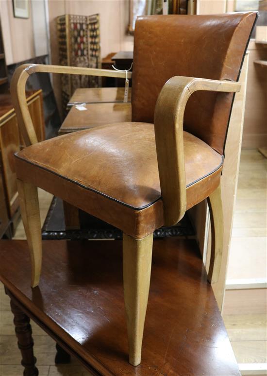 An Art Deco tan leather desk chair